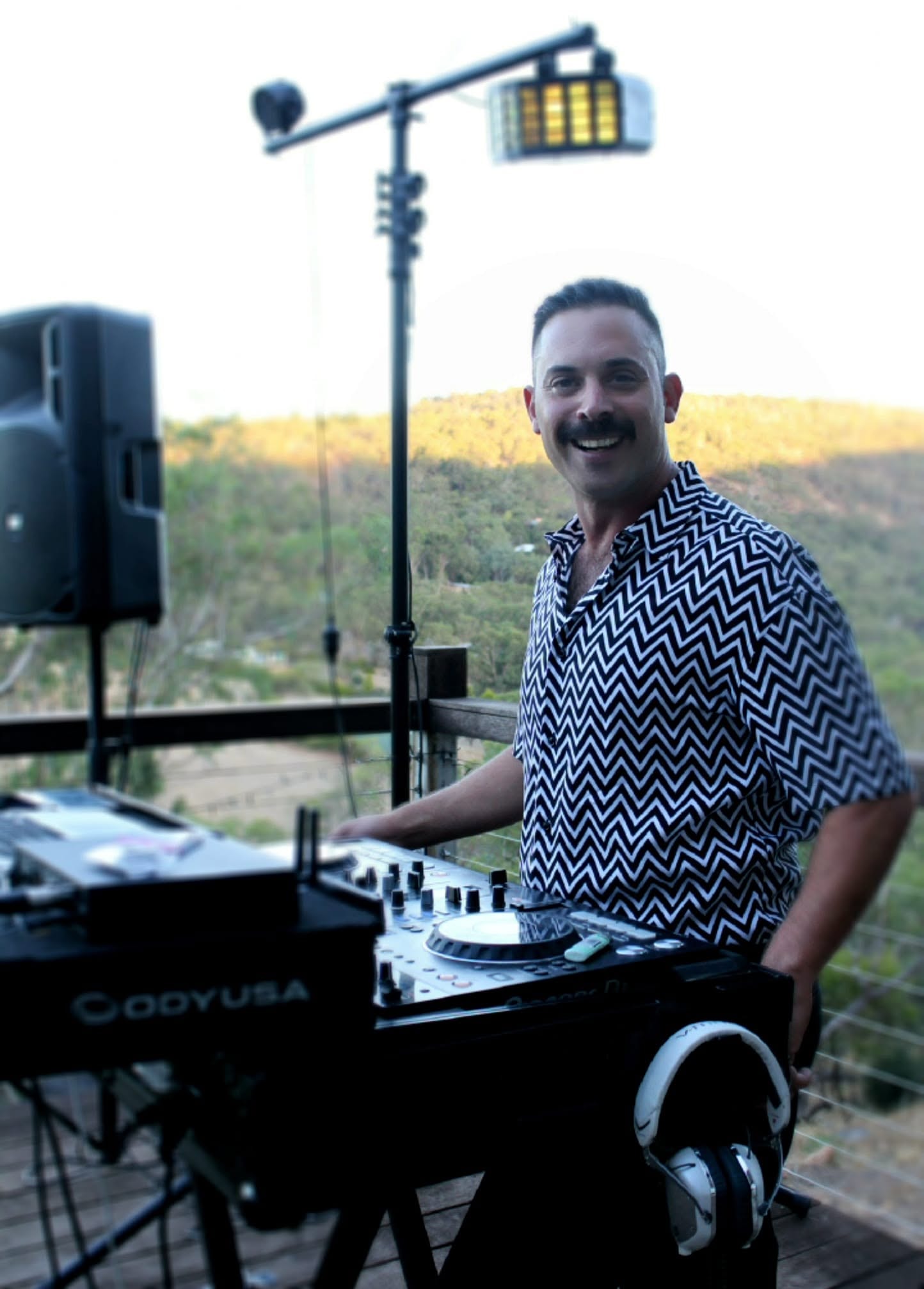 Eran DJing at an outdoor event